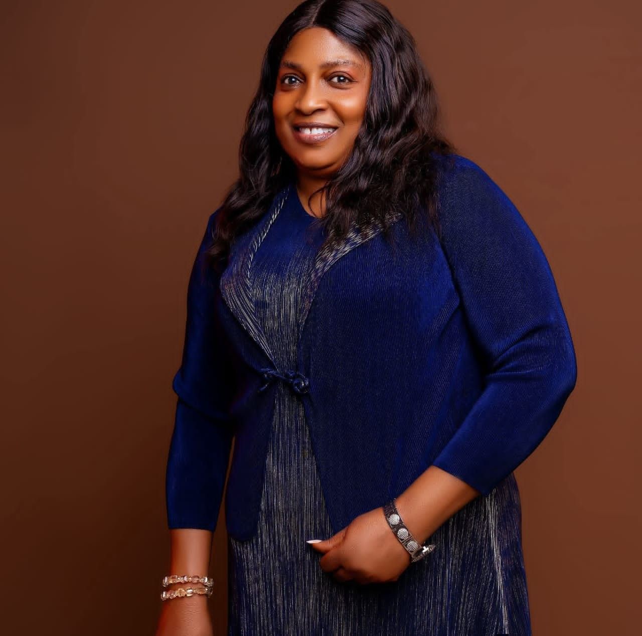 REV. (MRS.) LIZZY ADEBOYIN